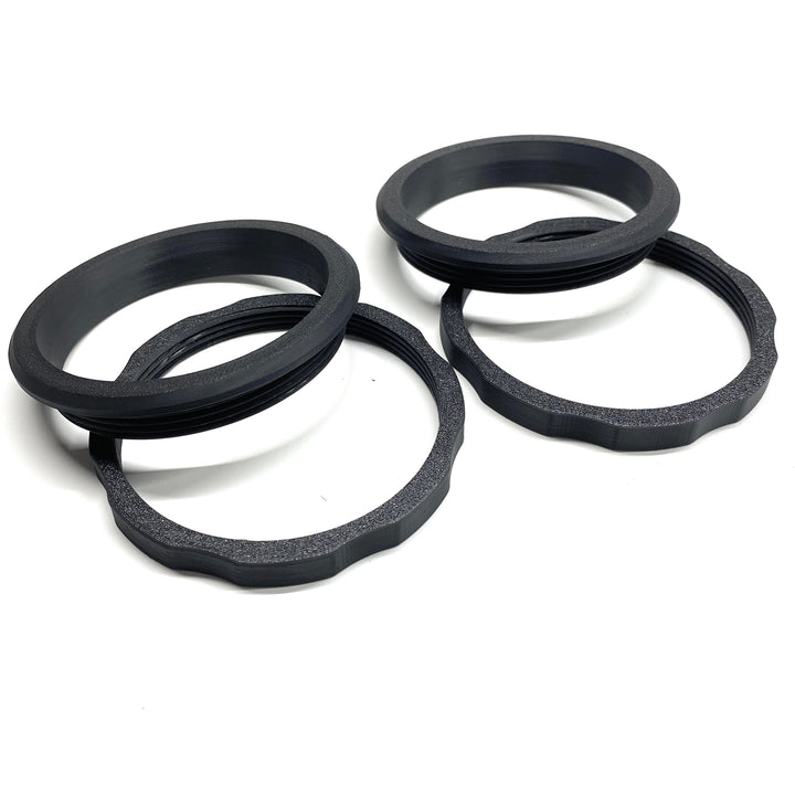 Bulkhead / rain tray trim rings for coilover adjustment